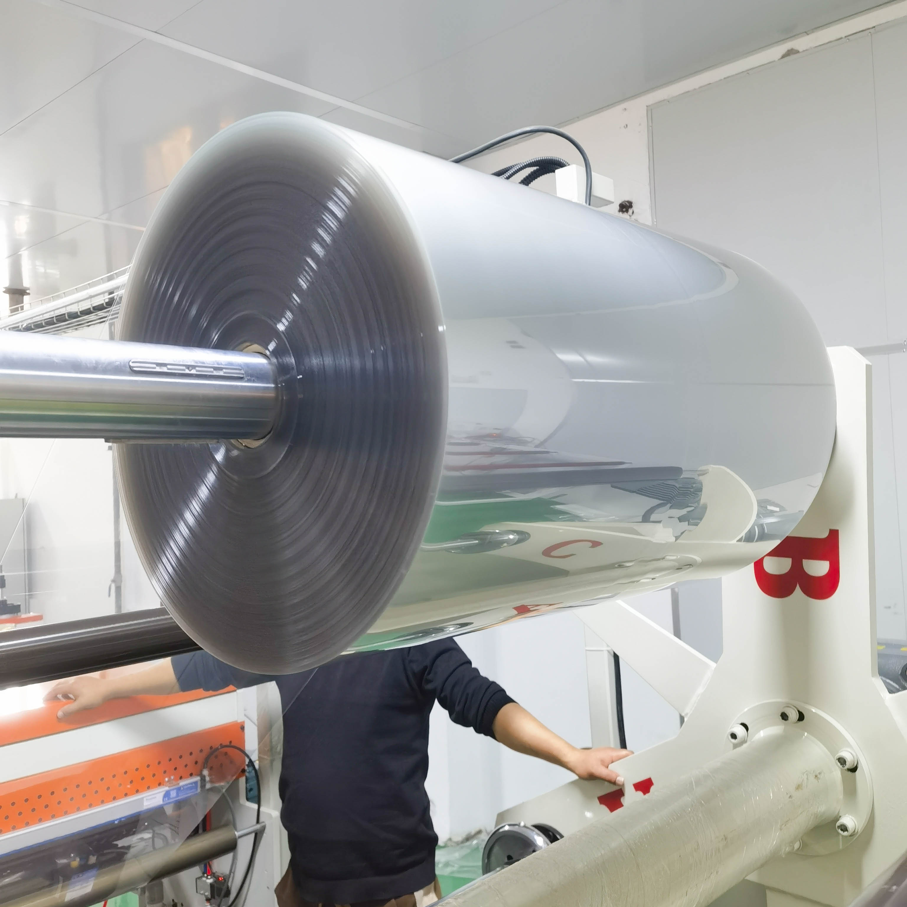 Clear PET roll manufacturing and inspection process
